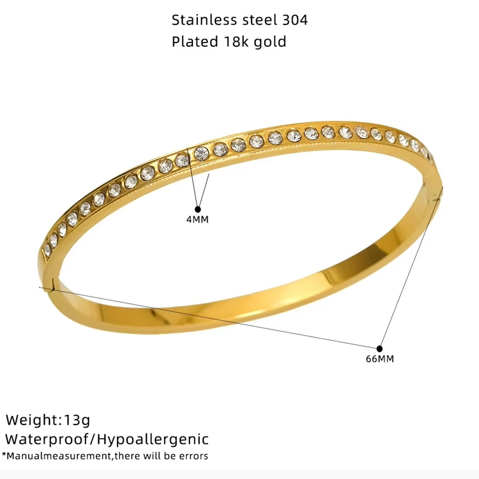 Bracciale rigido con gioielli personalizzati OEM placcato oro in acciaio inossidabile a forma di cuore con zirconi scintillanti